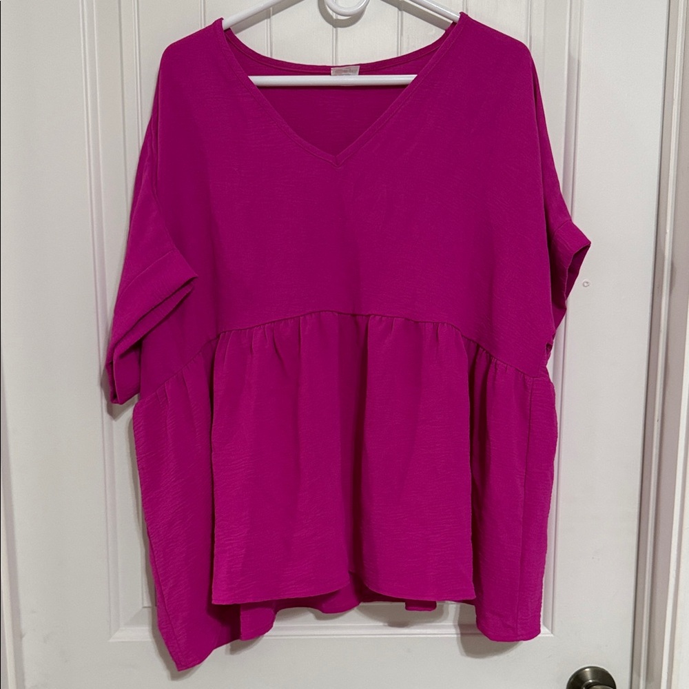 Women's V-Neck Peplum Tunic in Fuchsia